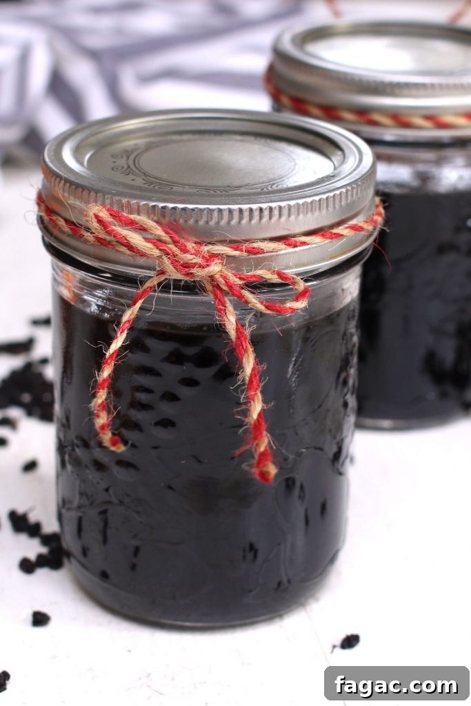 Lavender Simple Syrup for Cocktails and Drinks: Homemade Recipe 10 Elderberry syrup stored in mason jars.