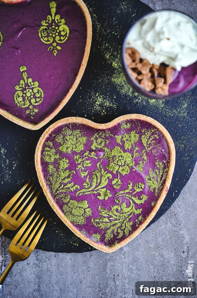Stunning stencilled Purple Sweet Potato Cheesecake Tart is a light, creamy, easy addition to your holiday dessert line-up. I Sugar Coat It