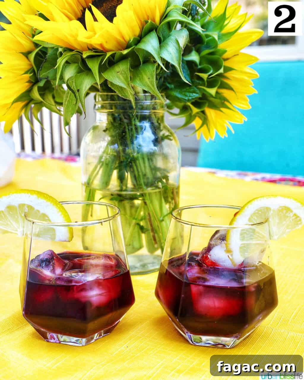 Authentic Tinto de Verano Recipe: Refreshing Spanish Wine Cooler 6 two glasses of red wine over ice.