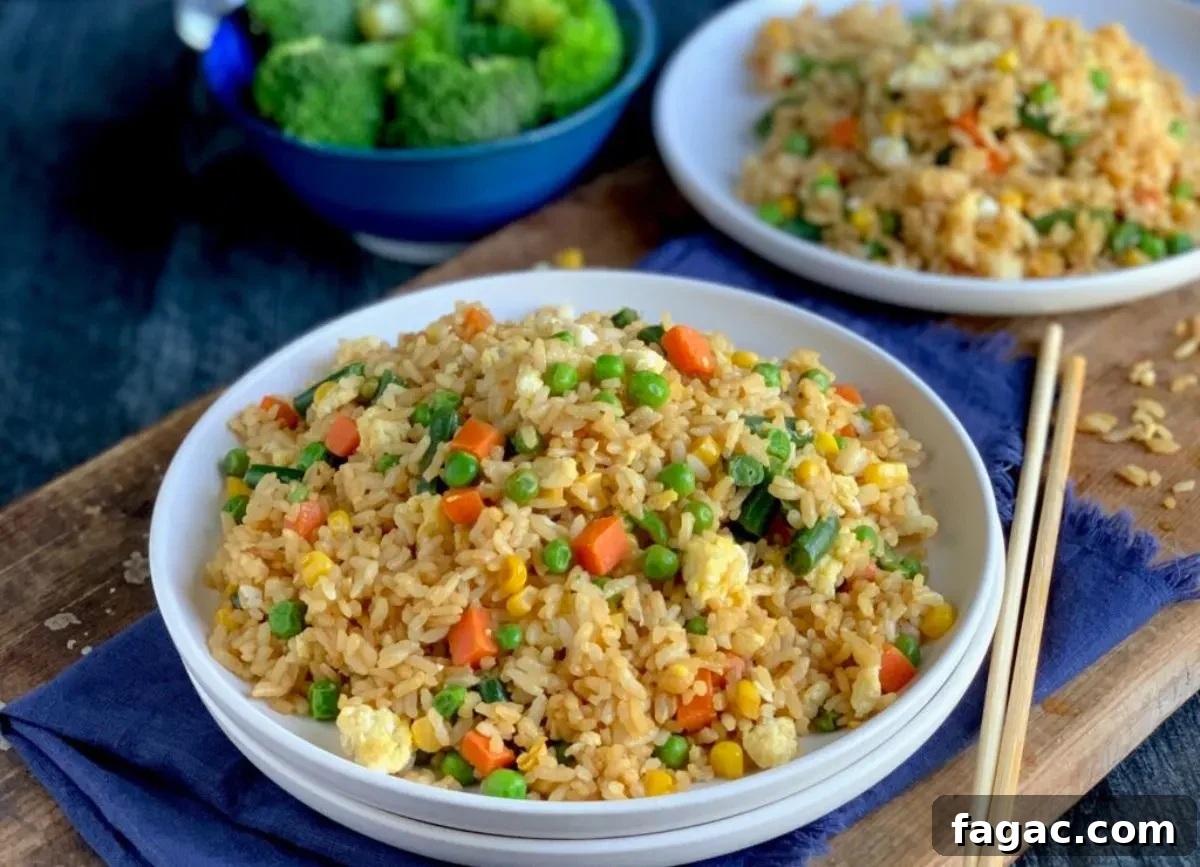 A BIG BOWL of Fried rice that is gluten  and dairy free. 