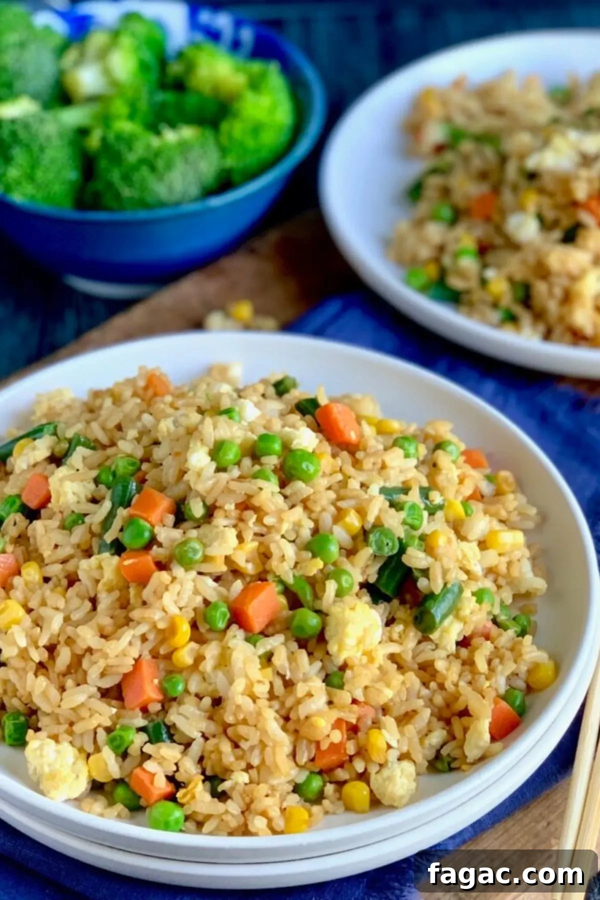 A couple bowls of fried rice.