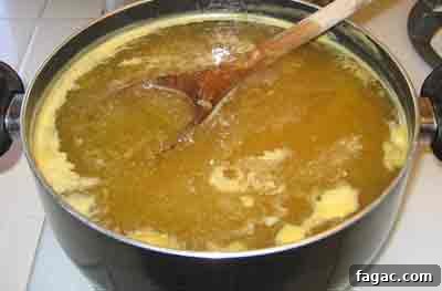 Quince Spoon Sweet Recipe (Kydoni Glyko) — Traditional Cypriot Preserve 6 Boiling the quince for greek spoon sweet recipe kythoni glyko.
