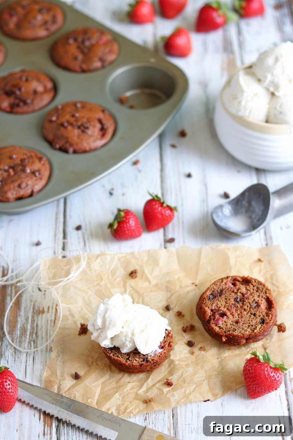Scooping ice cream into muffin Scooping ice cream into muffin