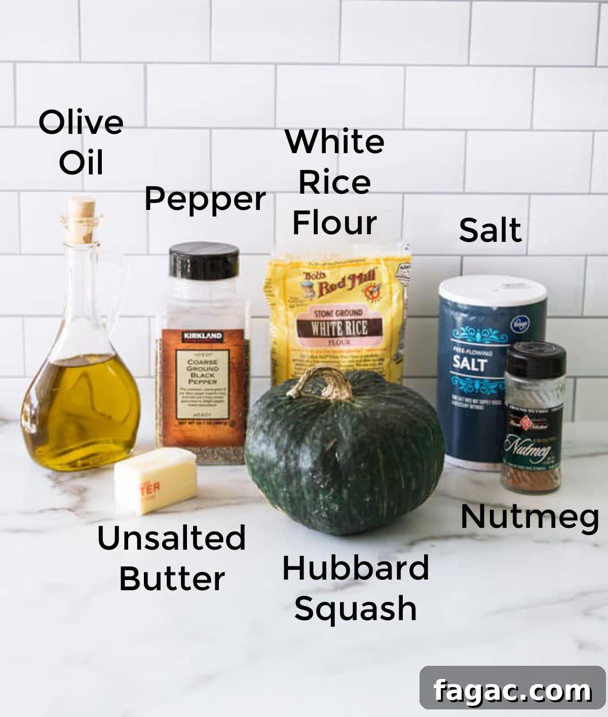 Creamy Hubbard Squash Soup Recipe for Fall Comfort 4 Olive oil, hubbard squash, butter, salt, pepper, nutmeg on counter.