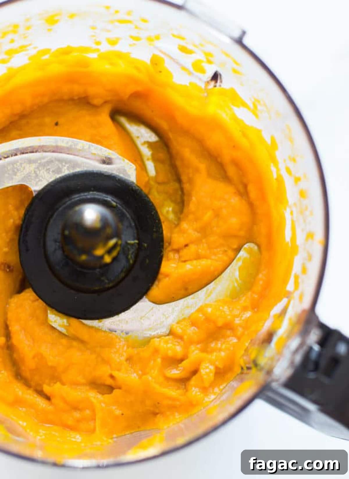 Creamy Hubbard Squash Soup Recipe for Fall Comfort 8 Pureed hubbard squash in a food processor.