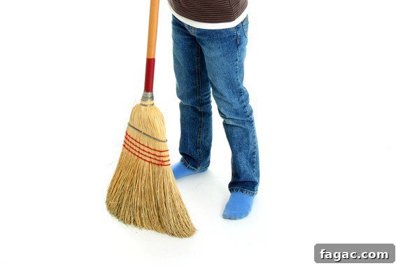 5 Ways to Make Life as a Work-at-Home Mom More Manageable 6 Girl cleaning the house with a broom