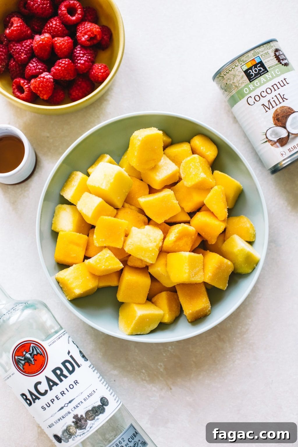 Bowls of ingredients for mango ice cream. 