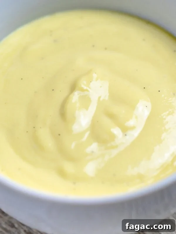 vanilla sauce bread pudding sauce in a bowl