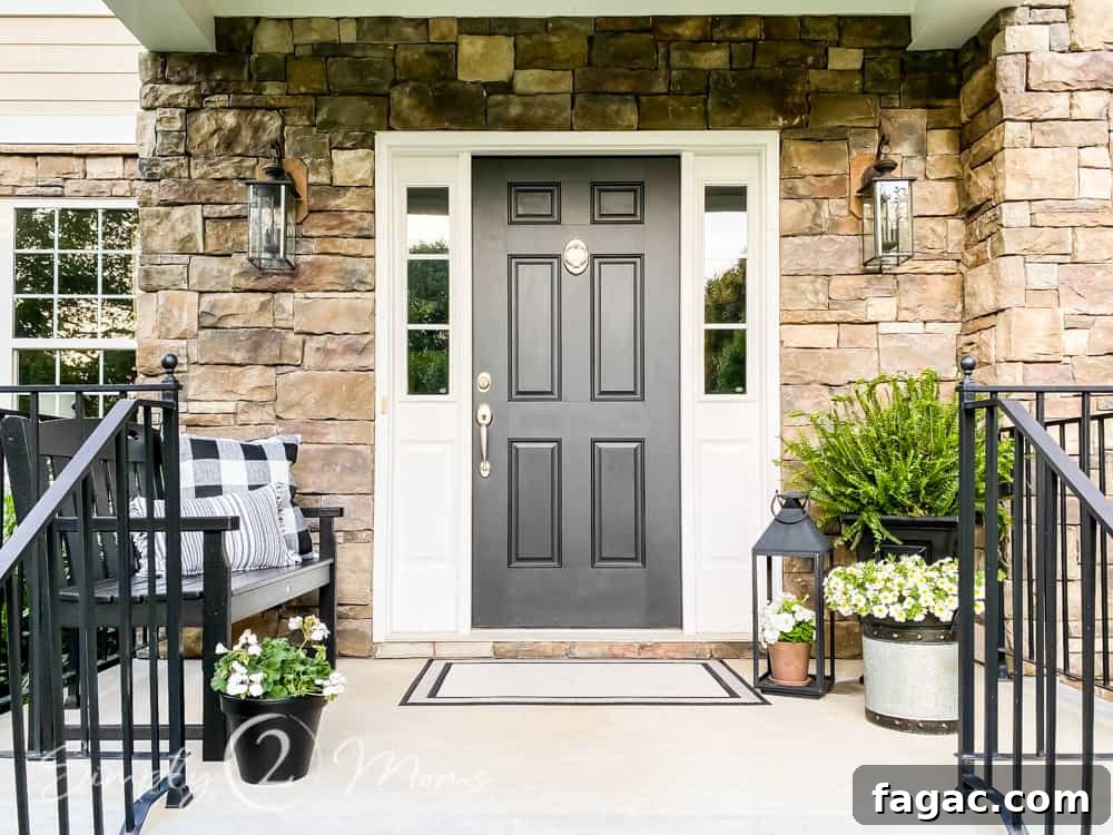 full view of front porch with flower post and bench