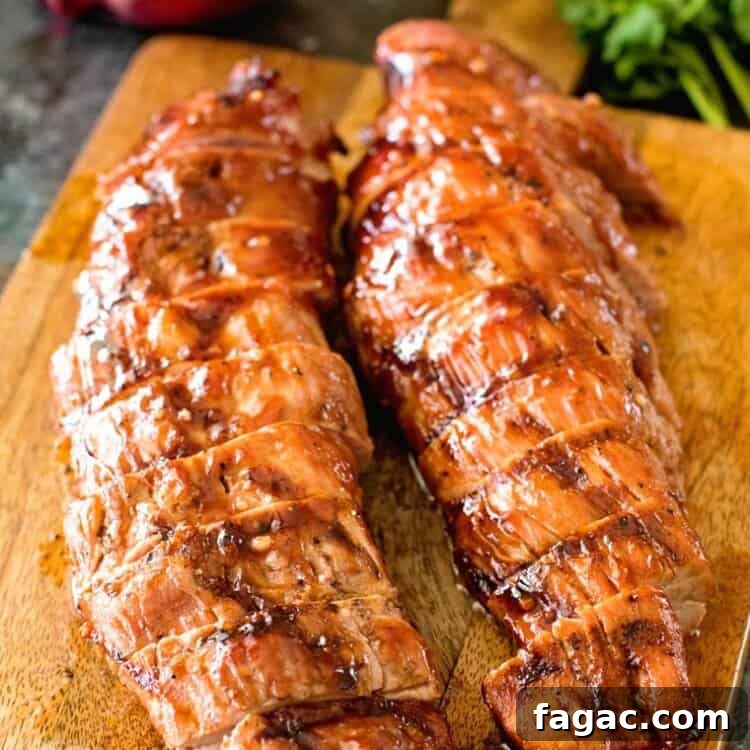 BBQ Pork Tenderloin Recipe: Juicy Grilled Pork Tenderloin Tips 5 bbq pork tenderloin resting on cutting board