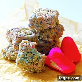 A pile of colorful rice krispie treats made with marshmallow peeps.