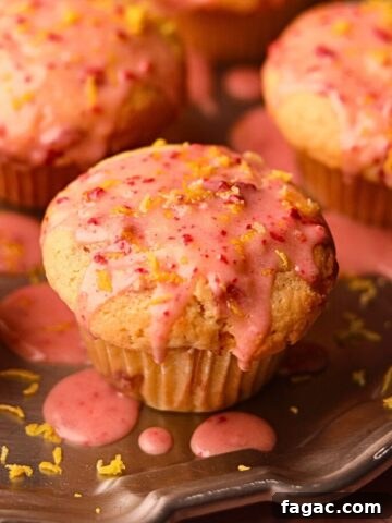 Strawberry lemonade, muffins on a silver platter.