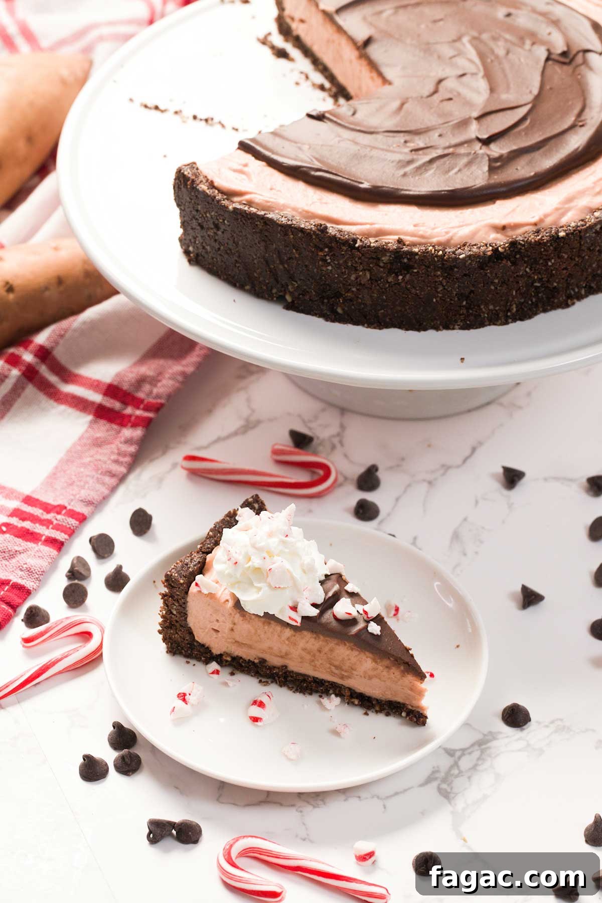 A slice of Healthier Gluten-Free Peppermint Cheesecake on a plate.