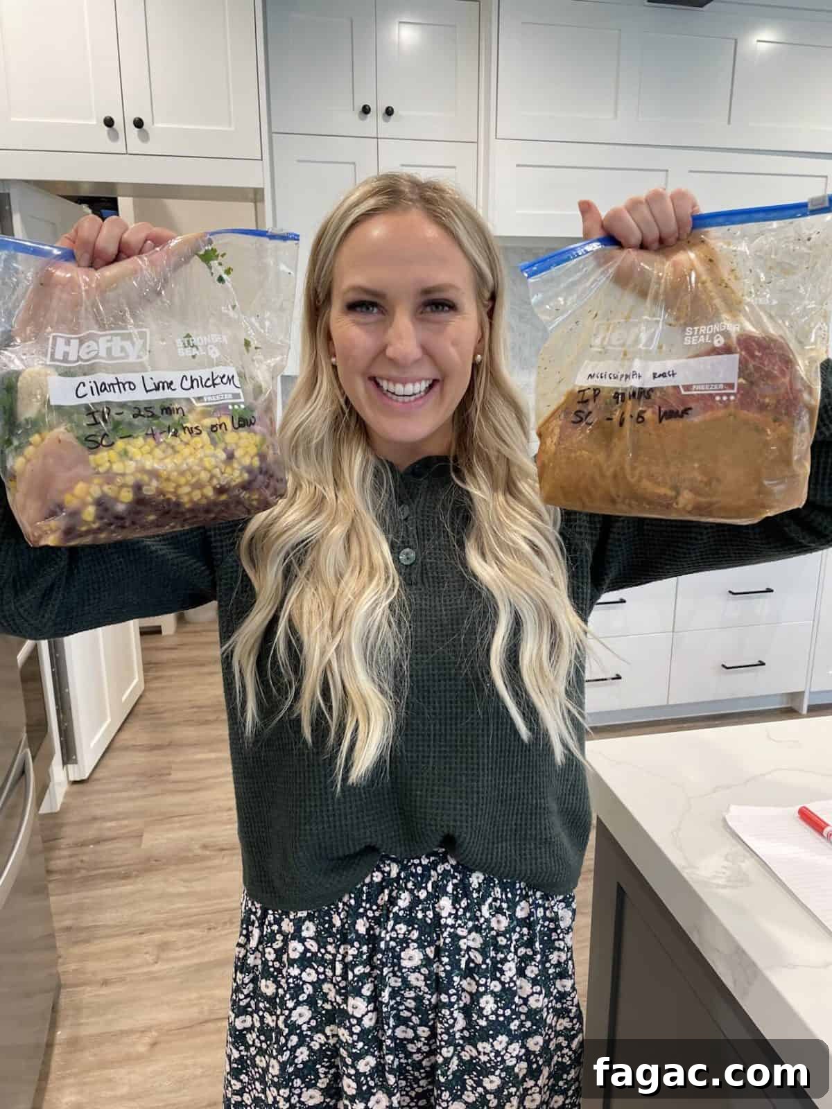 Meal Prep Guide: Plan and Freeze Make-Ahead Meals for Busy Weeks 2 kendra holding her prepped freezer meals in the air
