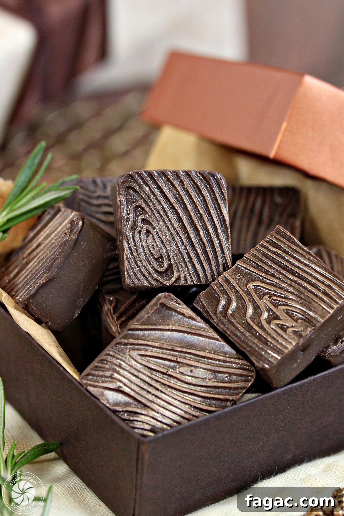 Rosemary Raspberry Truffles - box of square chocolate truffles with wood grain pattern