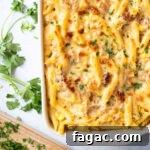 Tuna pasta bake in a white baking dish.