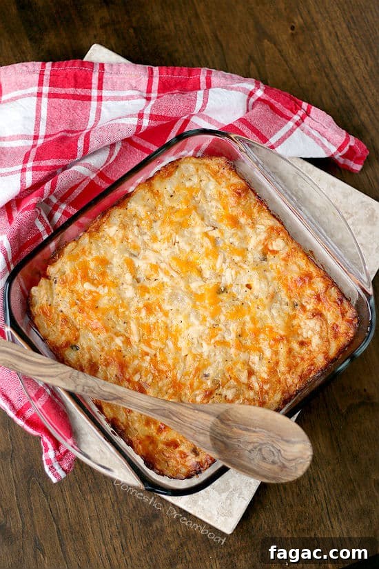 Tex-Mex Hash Brown Casserole with Cheesy Chorizo 6 Overhead photo of cheesy hashbrown casserole in a glass baking dish.