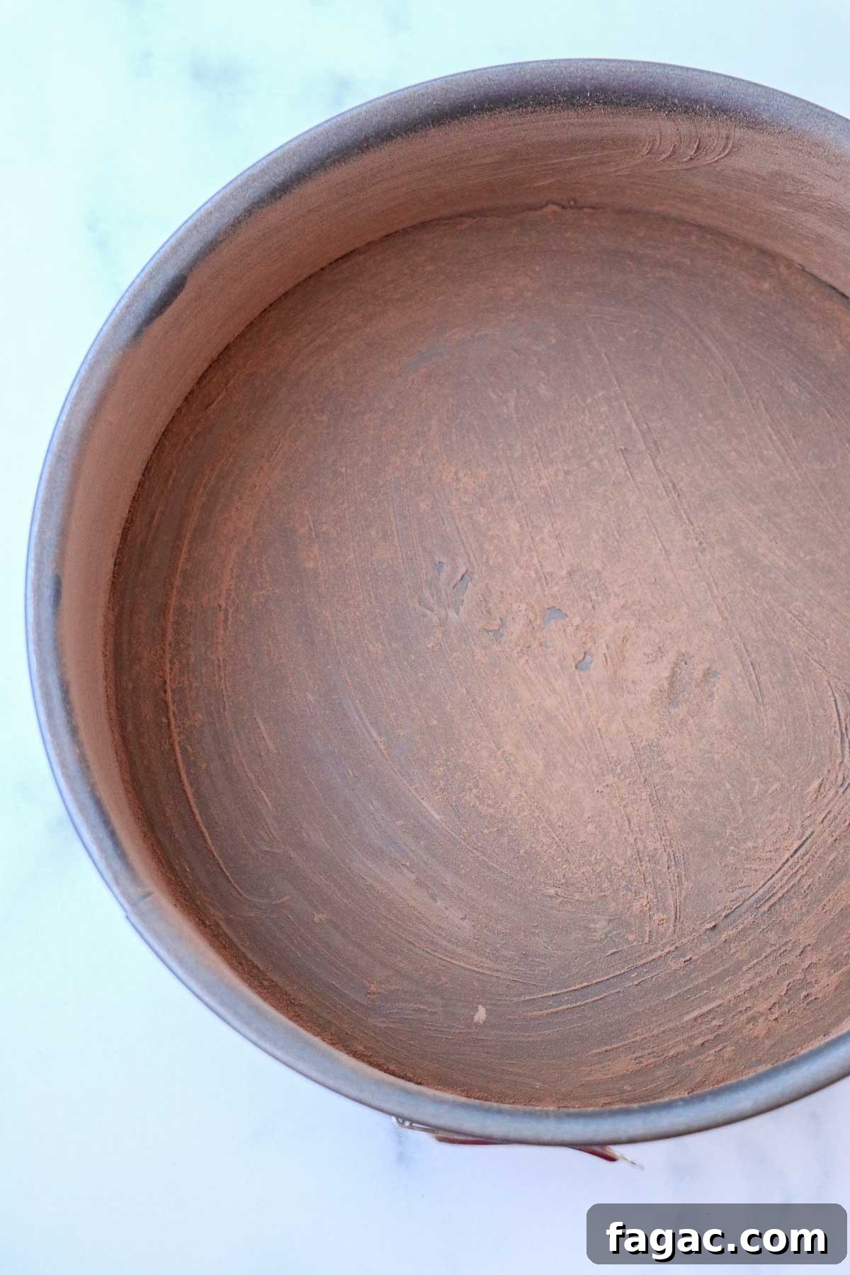 Authentic Swedish Kladdkaka: Gooey Sticky Chocolate Cake Recipe 4 Springform pan greased with butter and dusted with cocoa powder.