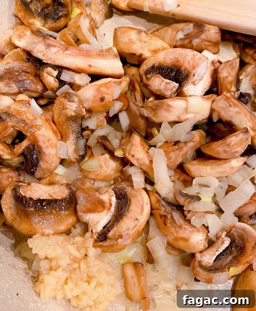 Quick Ground Beef Stroganoff Recipe for Weeknights 4 Sauteed Mushrooms and Onions in large skillet.