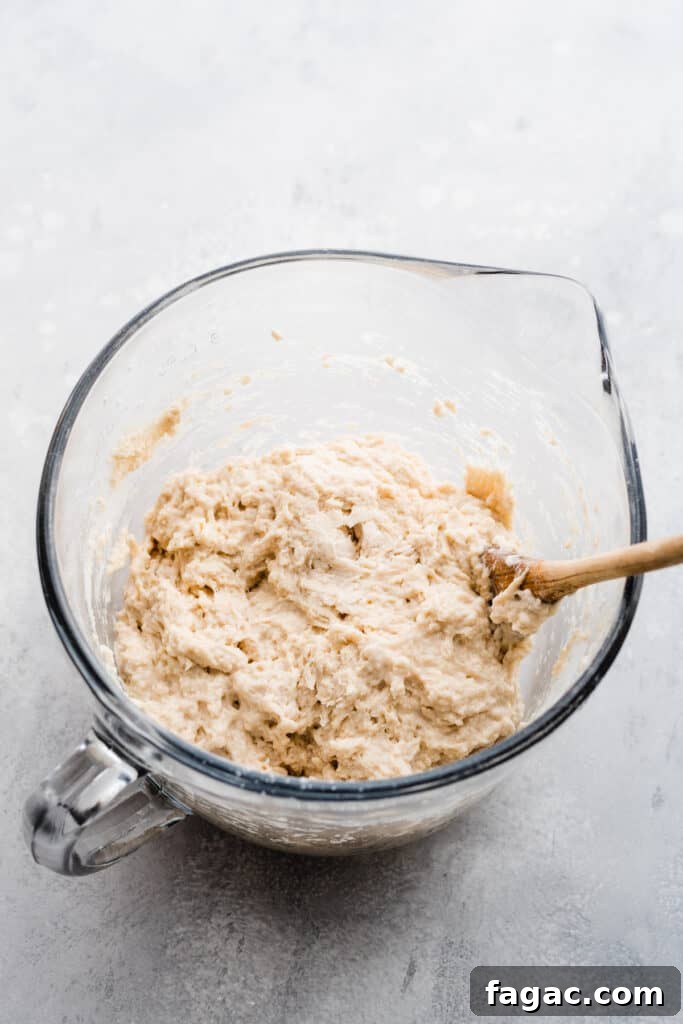 Classic Beer Bread with Salted Honey Butter Recipe 5 A mixing bowl with the wet shaggy beer bread batter
