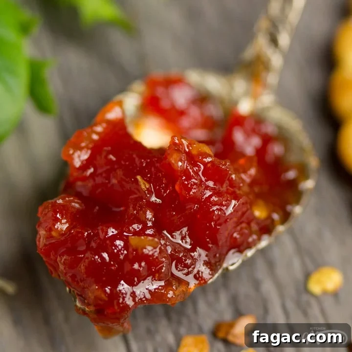 sweet chilli jam on a spoon