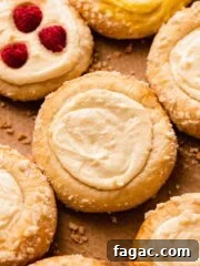 vatrushka with cottage cheese on parchment paper