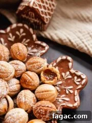 walnut shaped oreshki cookies on a plate