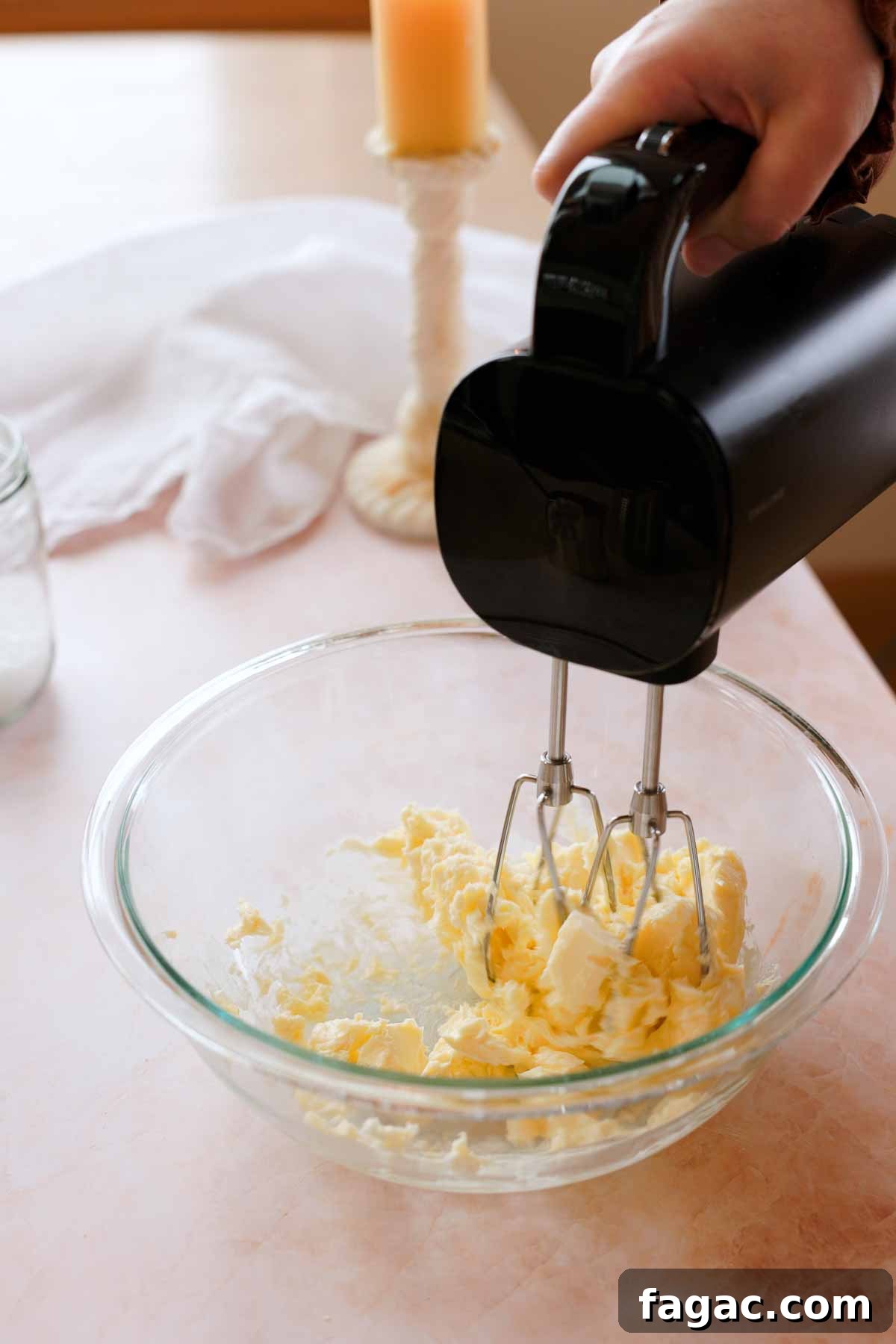 whipping butter until light and fluffy in a glass bowl
