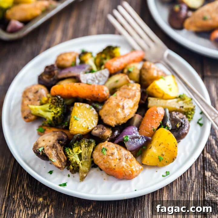 A plate of sausage and veggies with a fork on it.