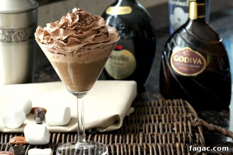 Mississippi Mudtini Recipe - simple Chocolate Martini recipe with marshmallow vodka, Godiva chocolate liqueuer, and Nocello. Fun Mississippi Mud drink! SnappyGourmet.com