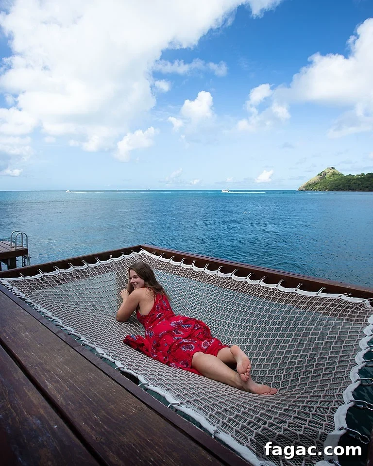Sandals Grande St. Lucian Resort & Spa — Adults-Only Caribbean Escape 13 Overwater bungalow deck and hammocks.