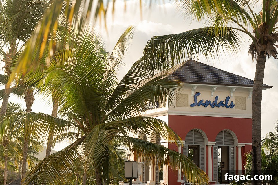 Sandals Grande St. Lucian Resort & Spa — Adults-Only Caribbean Escape 9 Couple strolling along the beach at Sandals Grande St. Lucian.