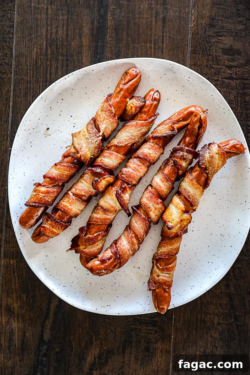 Crispy Bacon-Wrapped Hot Dogs: Air Fryer, Oven & Grill Methods 6 Baked Bacon Wrapped Hot Dogs.