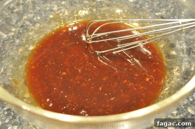Whisking the sauce ingredients Whisking the sauce ingredients
