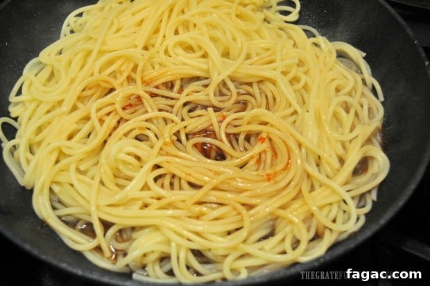 Adding sauce to cooked pasta Adding sauce to cooked pasta