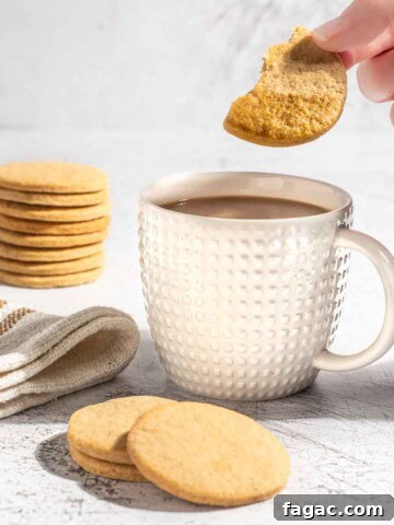 Dunking an outydse soetkoekie in a mug of coffee.