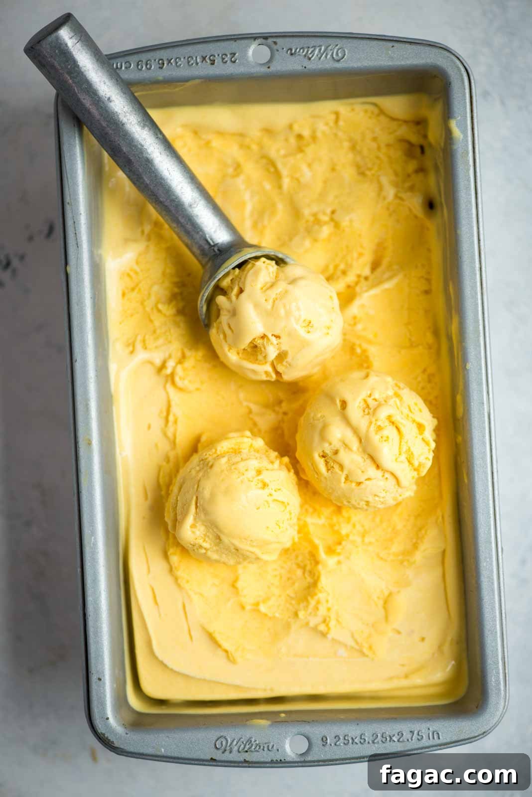 Homemade mango ice cream made without an ice cream maker.