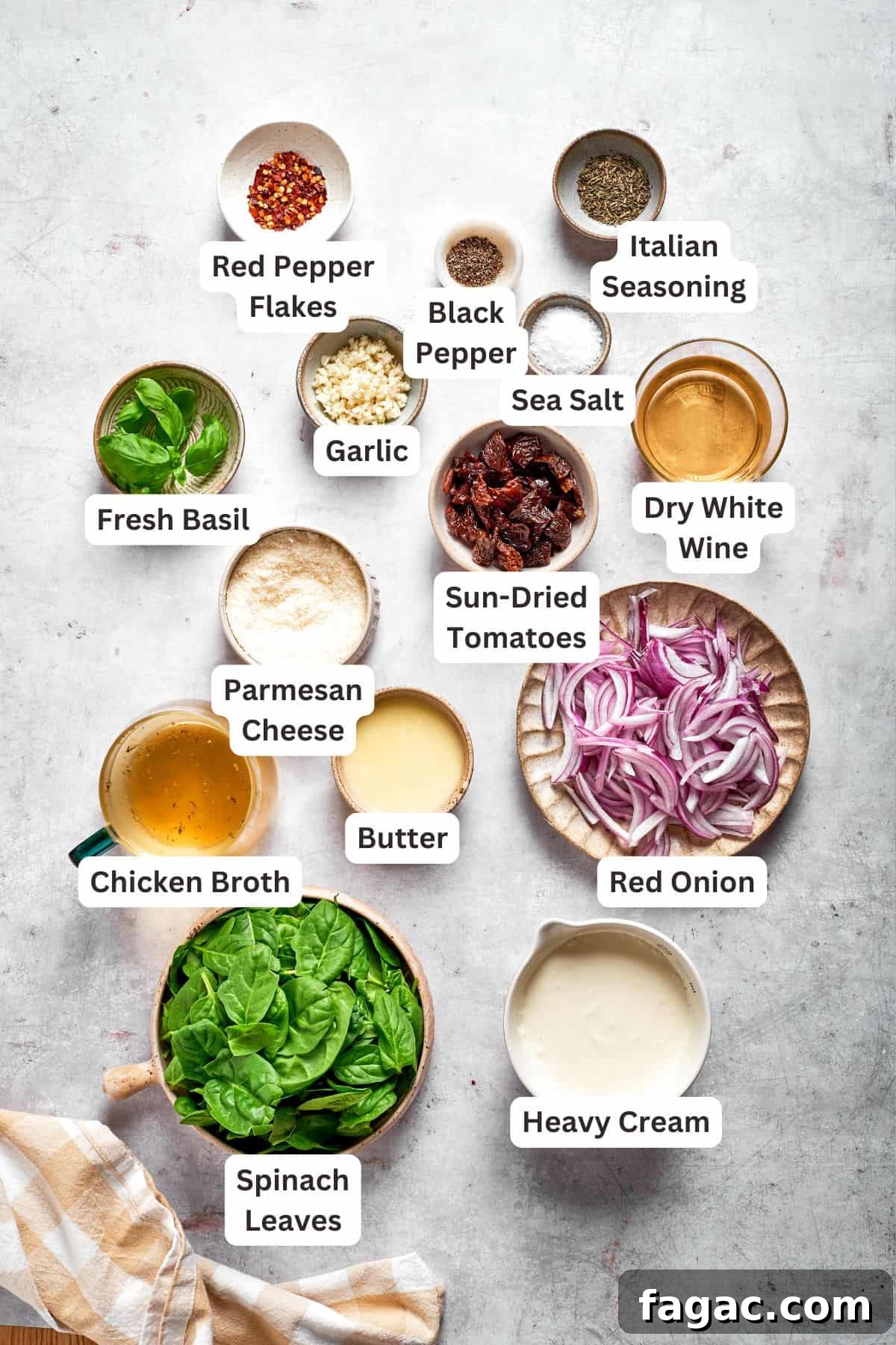 Cheesy, marry me chicken pasta features tender bites of chicken swirled in a creamy sauce along with sundried tomatoes and pasta. The ingredients for marry me chicken pasta are text-labeled.