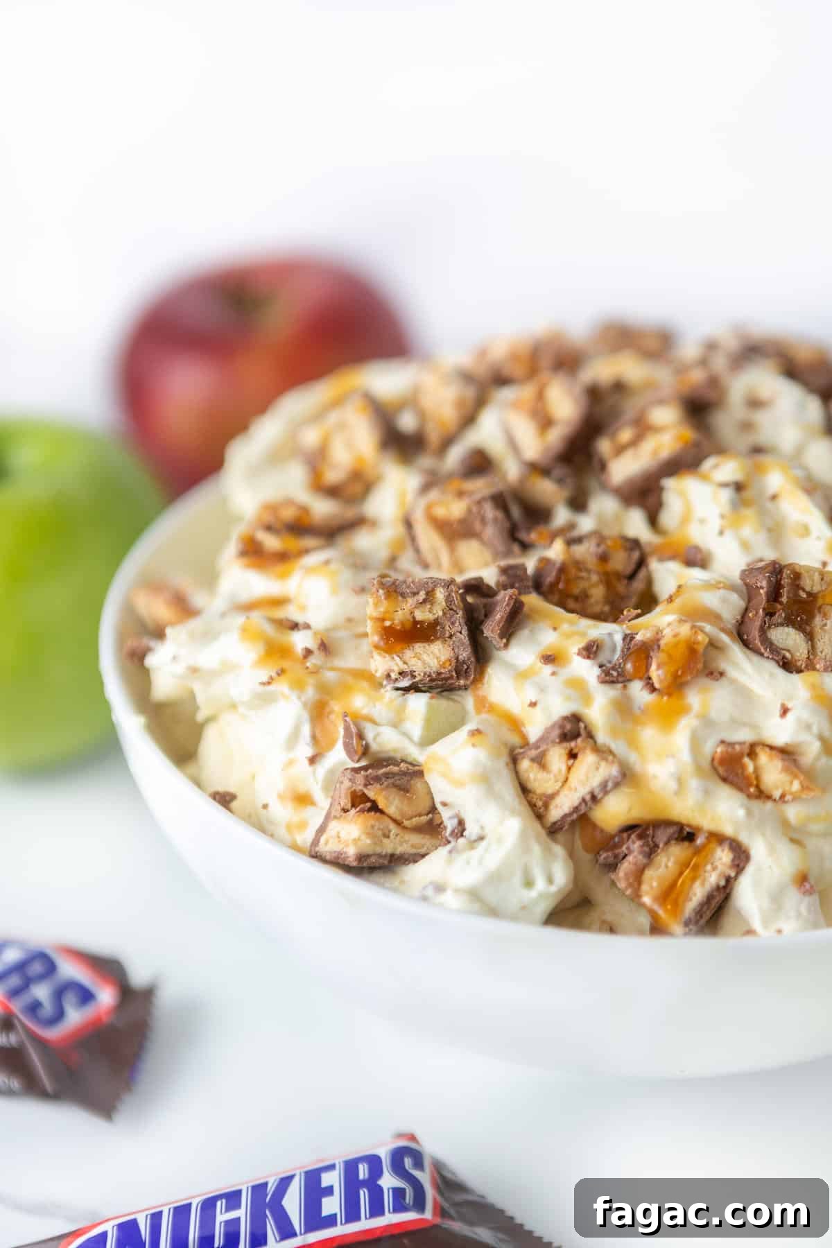 Apple Snickers Salad Recipe: Crunchy Caramel Apple Dessert Salad 9 Bowl of creamy apple snickers salad dessert