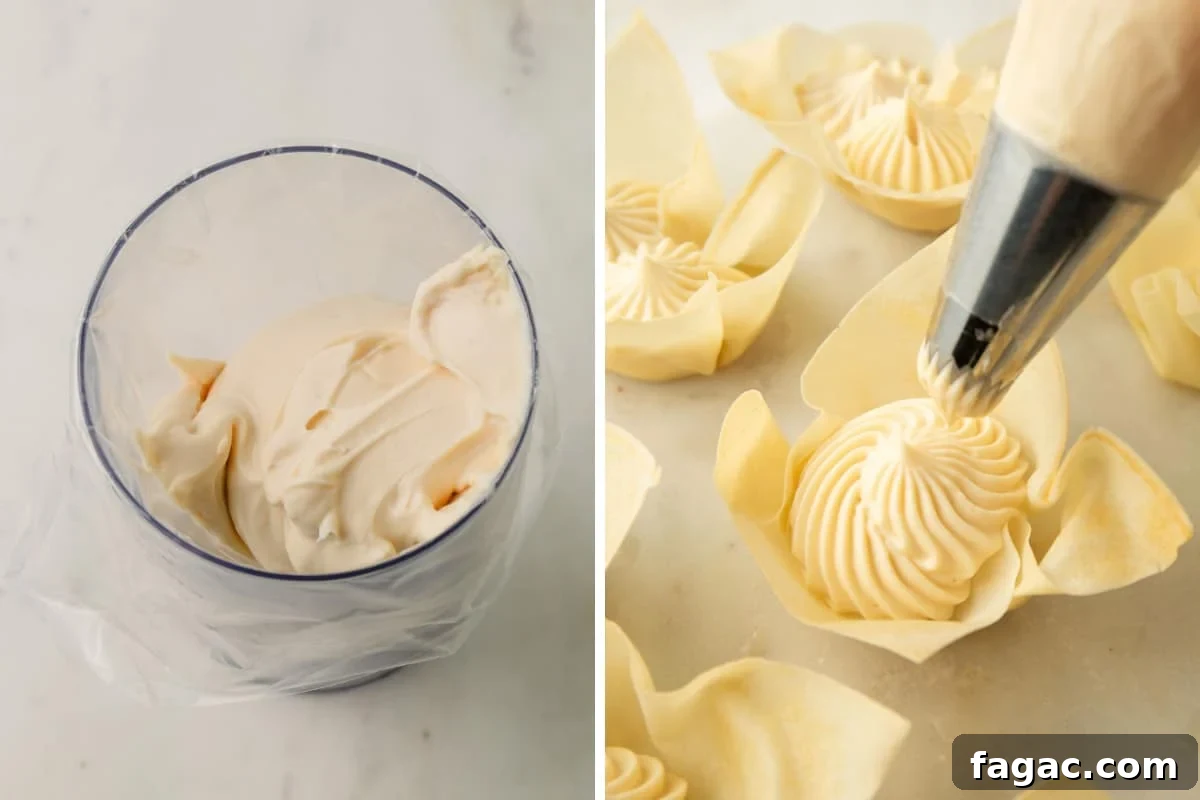 Quick Berry Tartlets: Simple Fresh Fruit Pastry Recipe 7 Mascarpone filling in a piping bag and being piped into baked spring roll wrapper cups.