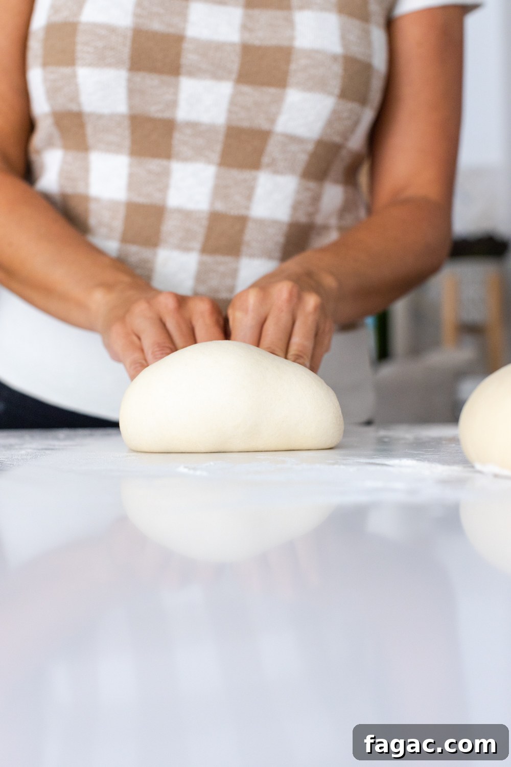 30-Minute Homemade Pizza Dough Recipe for Crispy Crust 16 pressing pizza dough