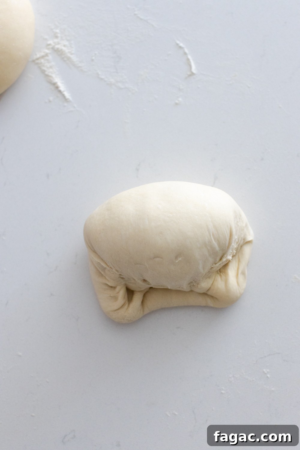 30-Minute Homemade Pizza Dough Recipe for Crispy Crust 17 shaping pizza dough