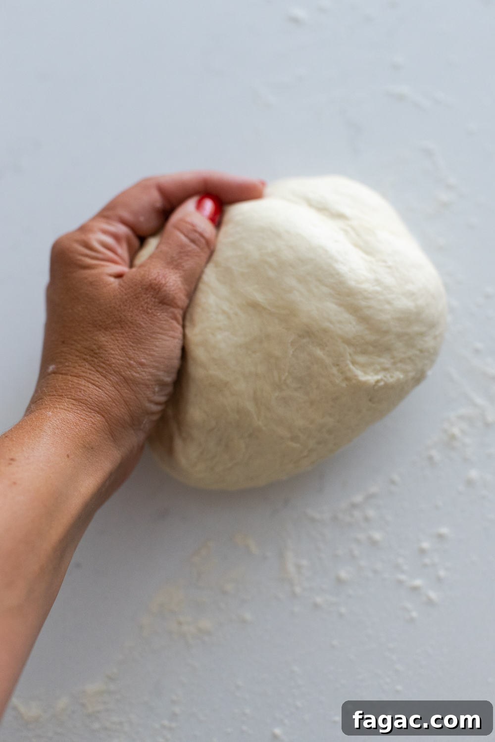 30-Minute Homemade Pizza Dough Recipe for Crispy Crust 9 how to knead pizza dough