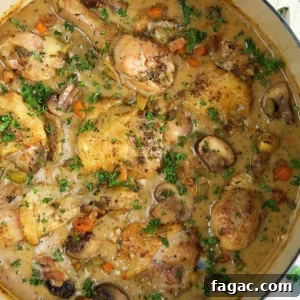 Classic Chicken Fricassee Recipe: Creamy One-Pot French Comfort Meal 5 Chicken fricassee is in a large dutch oven.