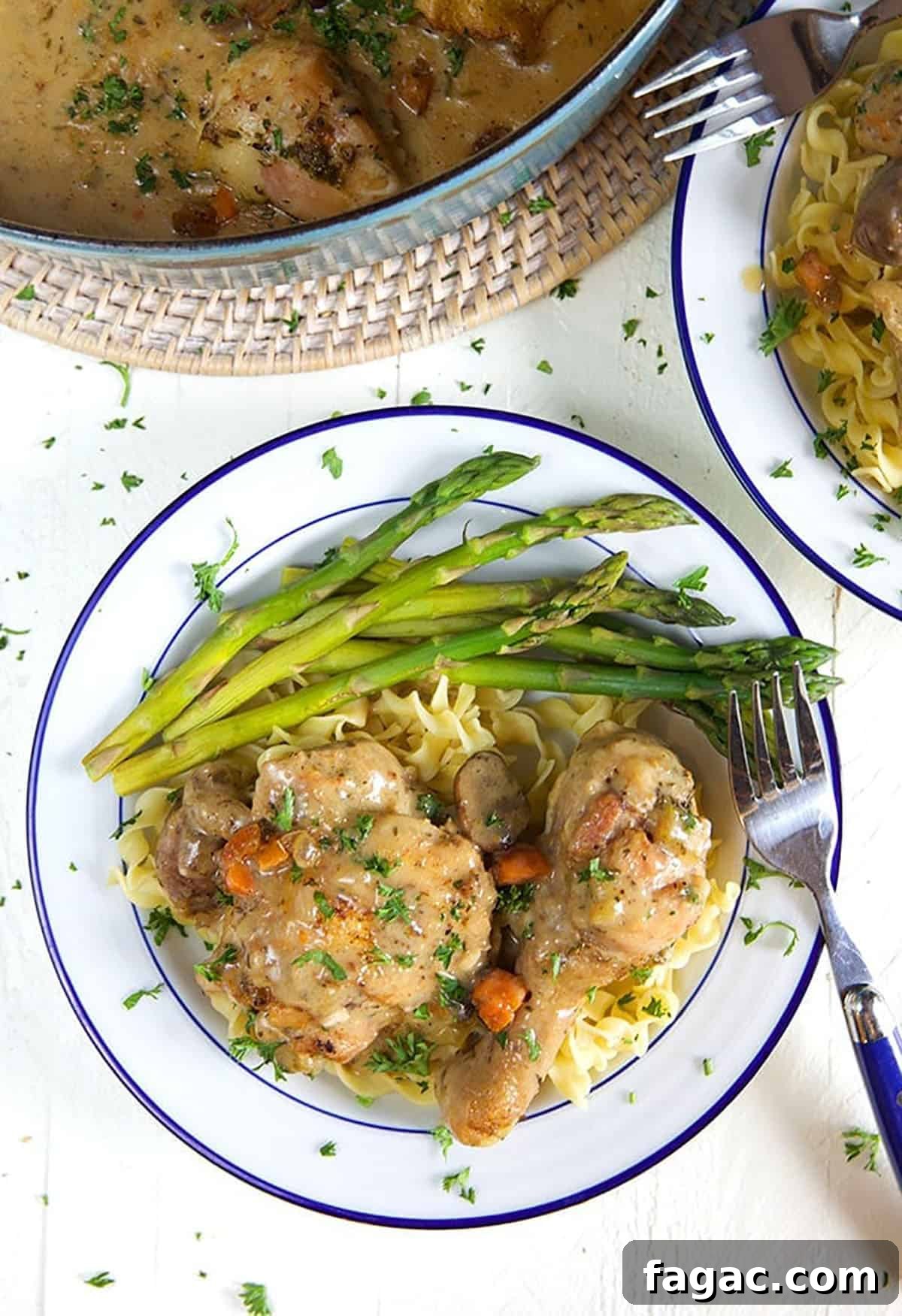 Classic Chicken Fricassee Recipe: Creamy One-Pot French Comfort Meal 7 A plate of chicken fricassee and asparagus is ready to be eaten.