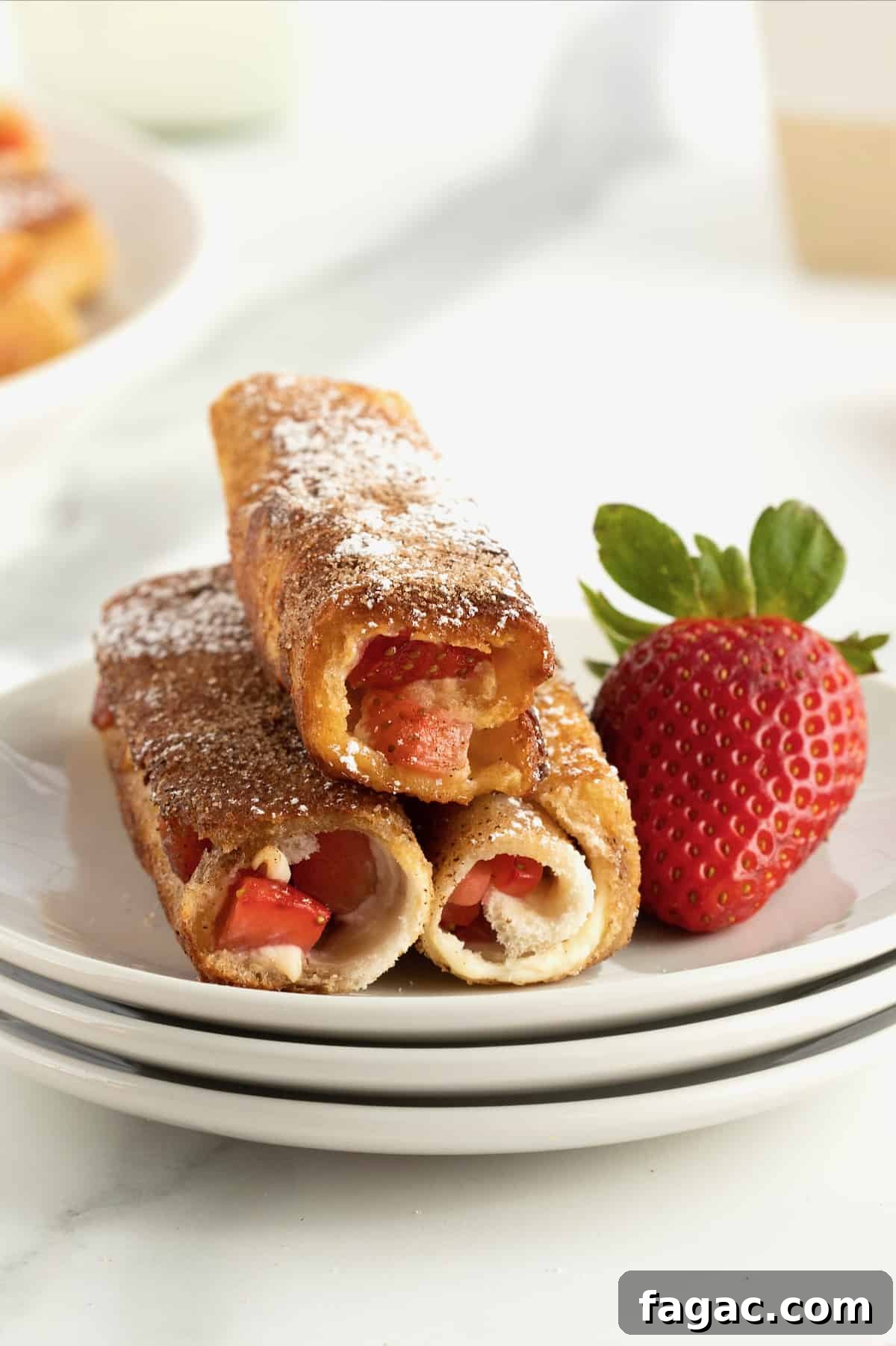 Strawberry Cream Cheese French Toast Roll-Ups Recipe 2 Strawberry Cream Cheese French Toast Roll Ups by The BakerMama