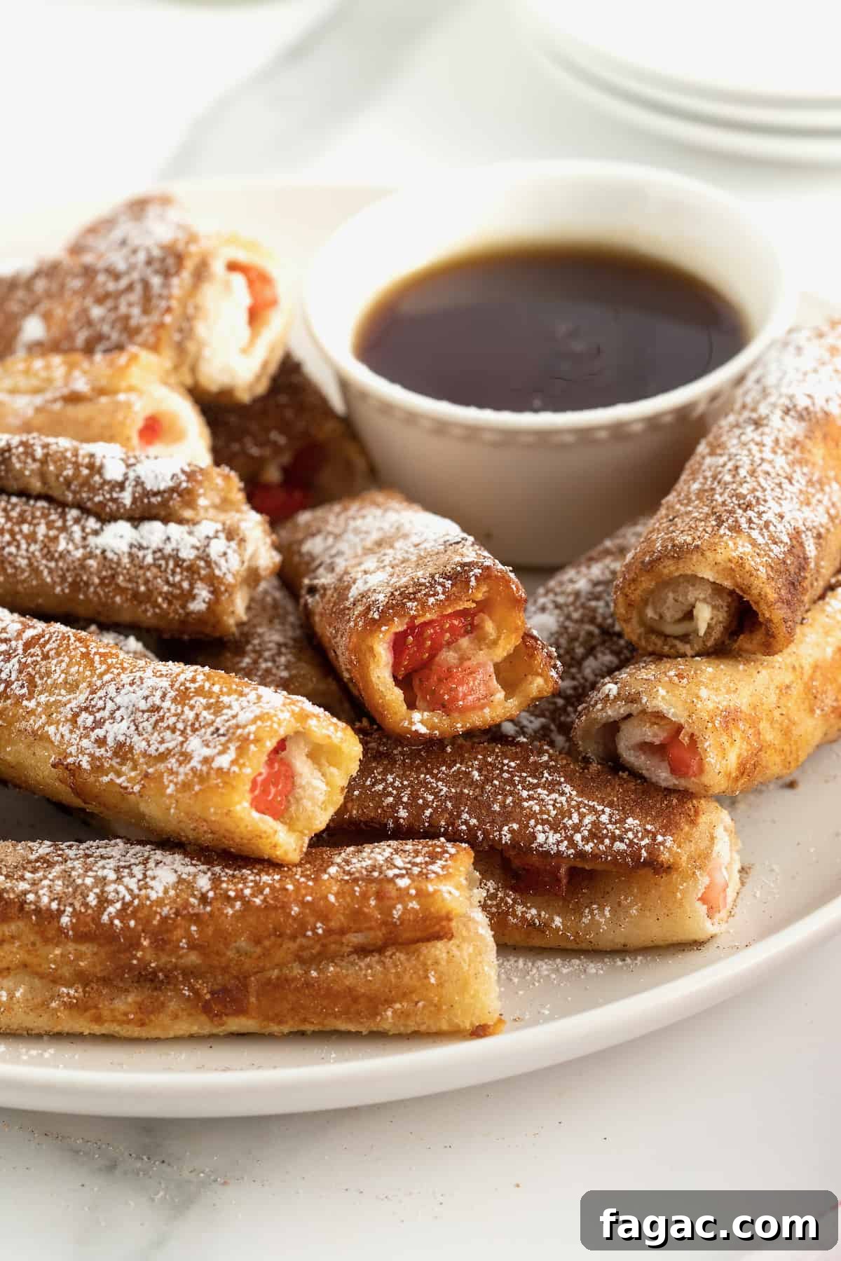 Strawberry Cream Cheese French Toast Roll-Ups Recipe 4 Strawberry Cream Cheese French Toast Roll Ups by The BakerMama