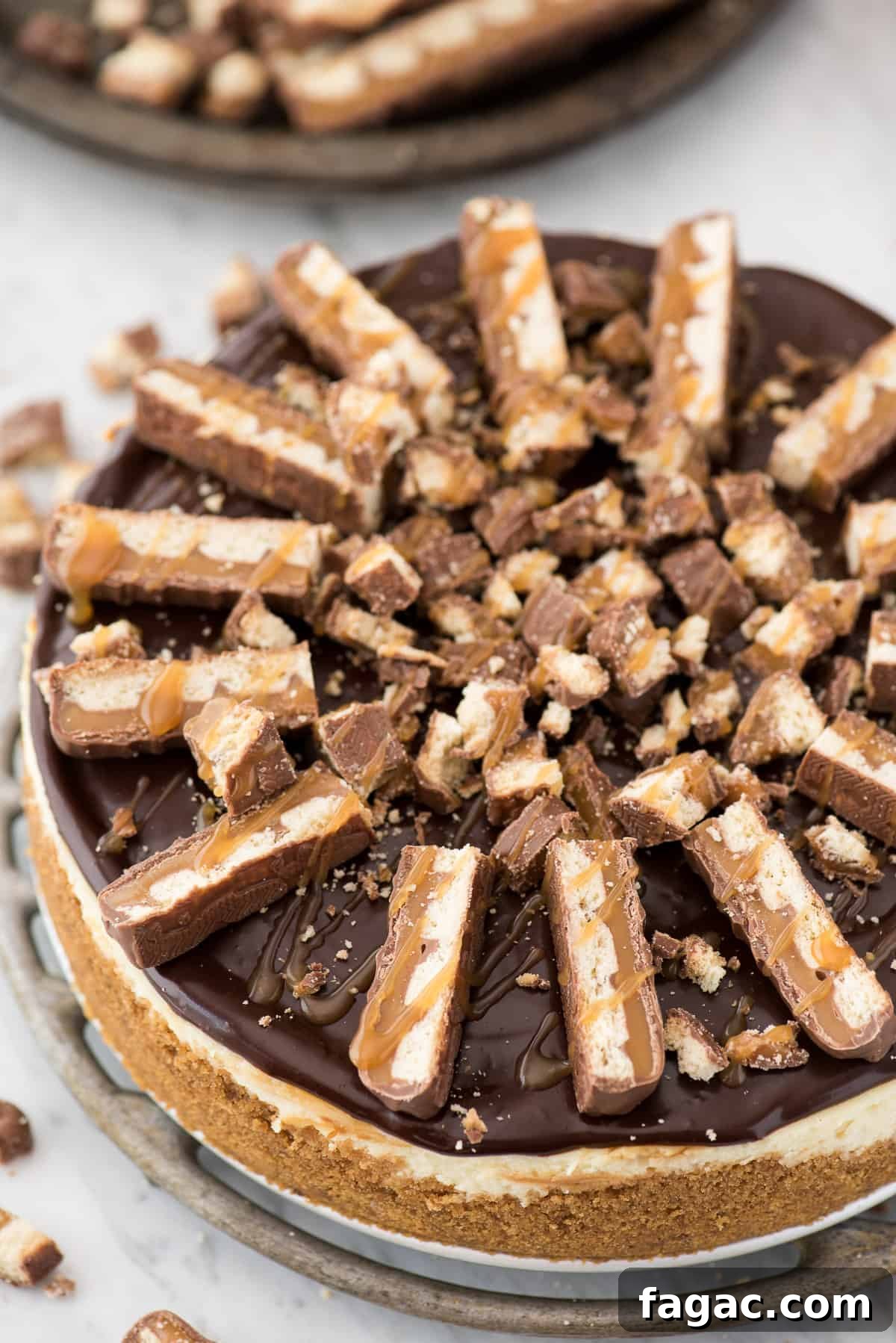Twix cheesecake chilled and ready to slice Cheesecake chilled and plated