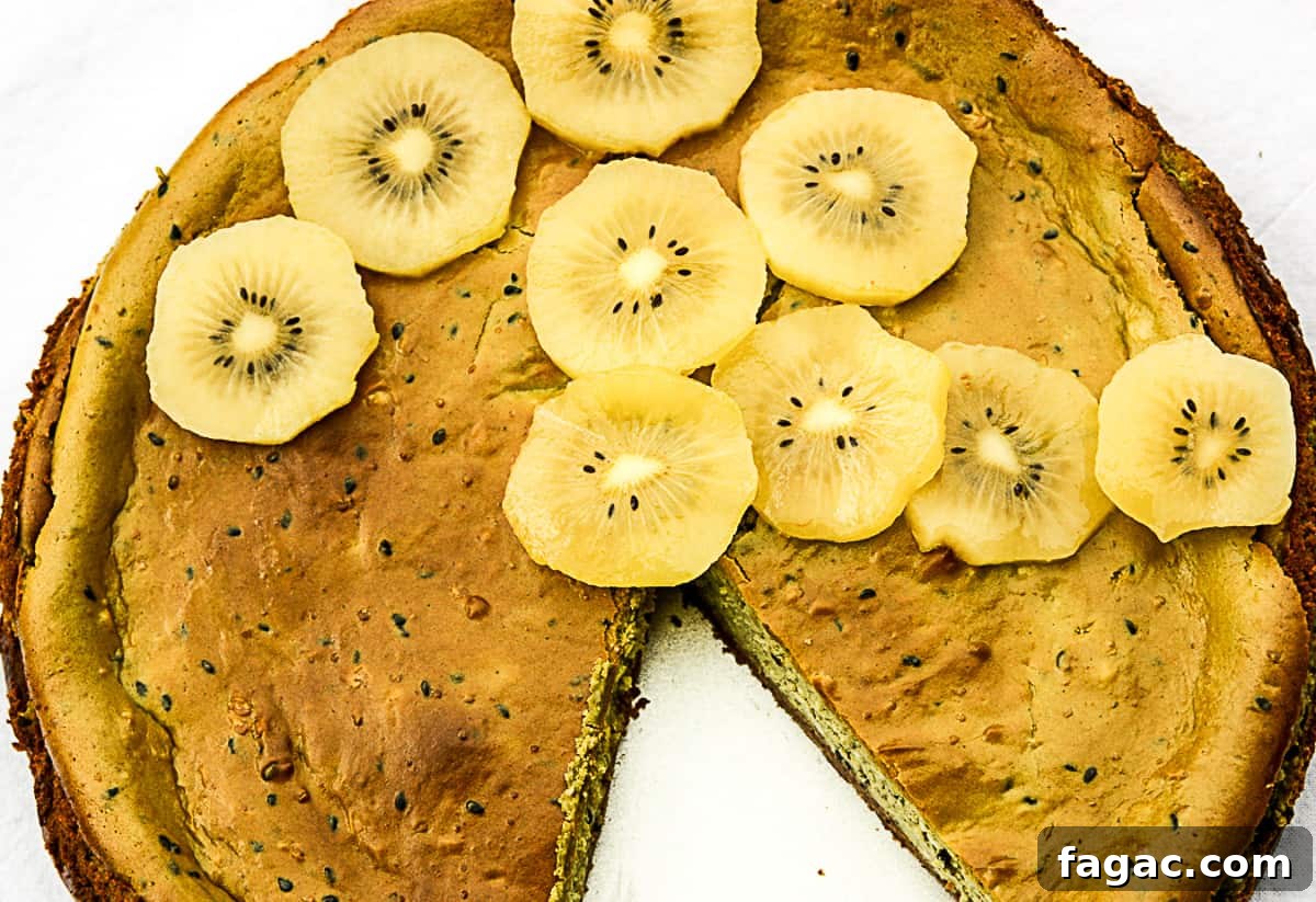 Creamy Matcha Green Tea Cheesecake Recipe 2 Matcha cheesecake with a slice removed.