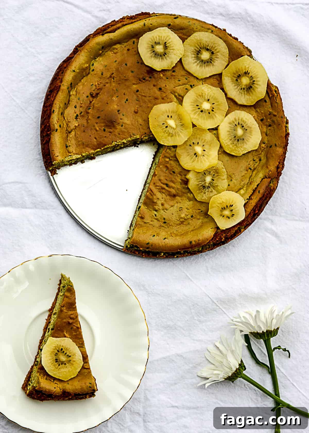 Creamy Matcha Green Tea Cheesecake Recipe 3 Cheesecake being sliced and placed on a white plate.